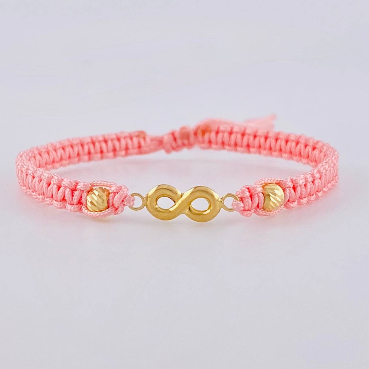 Pulsera Tejida Rosada Herraje Infinito Bolas Diamantadas 4Mm / 2 Und Oro Amarillo 18K
