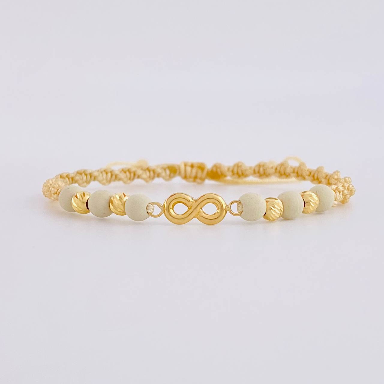 Pulsera Tejida Beige Herraje Infinito Bolas Diamantadas 4Mm / 4 Und Oro Amarillo 18K