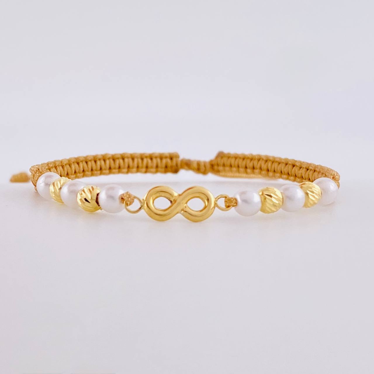 Pulsera Tejida Cafe Herraje Infinito Bolas Diamantadas 4Mm / 4 Und Oro Amarillo 18K