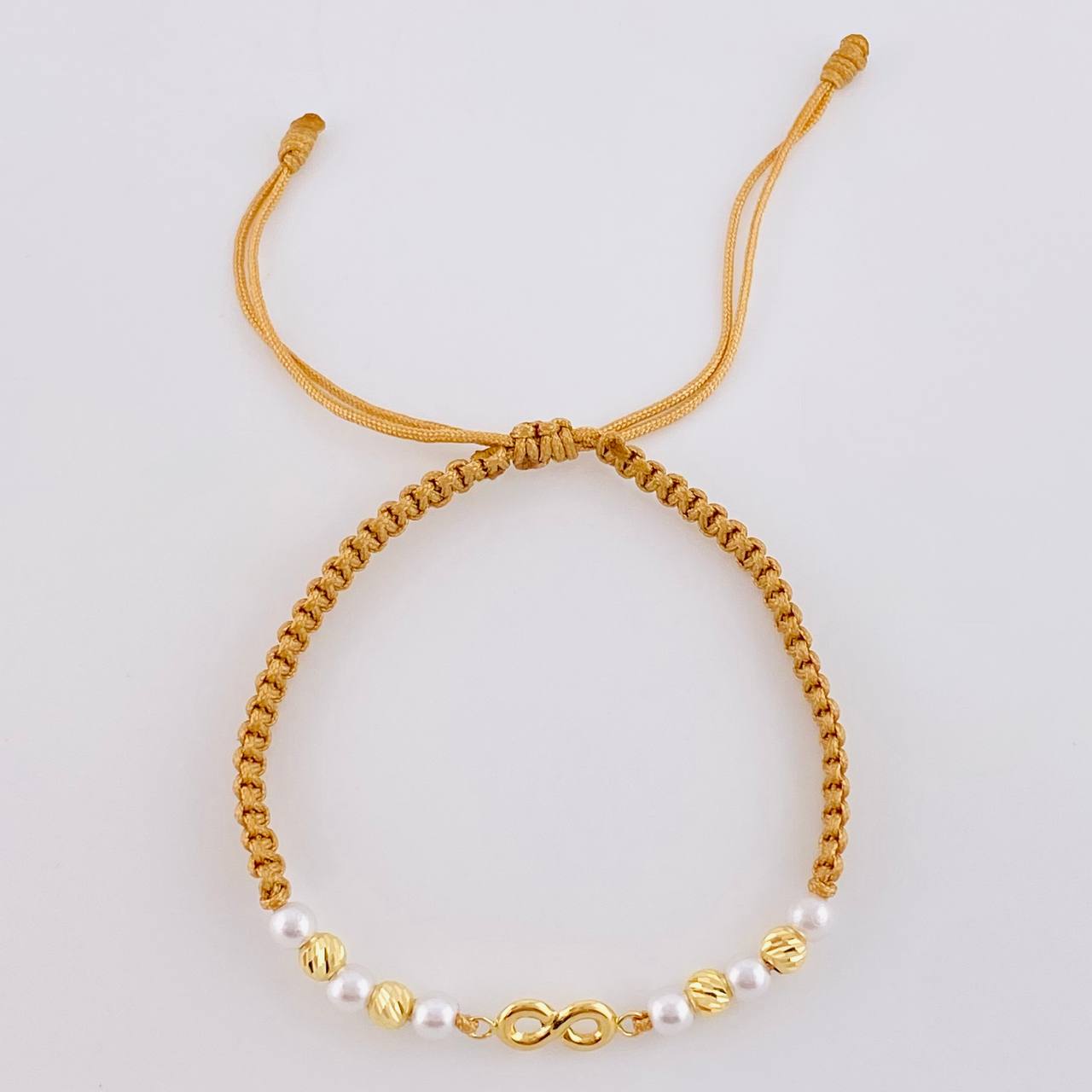 Pulsera Tejida Cafe Herraje Infinito Bolas Diamantadas 4Mm / 4 Und Oro Amarillo 18K