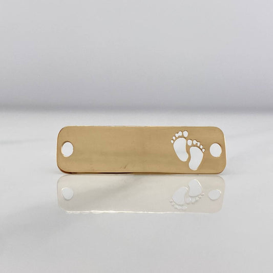 Herraje Placa Huellitas 0.8 g /1 in Oro Amarillo 18K