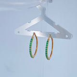 Candongas Encanto Esmeralda 3.2gr / 1 in / Oro Amarillo 18K %