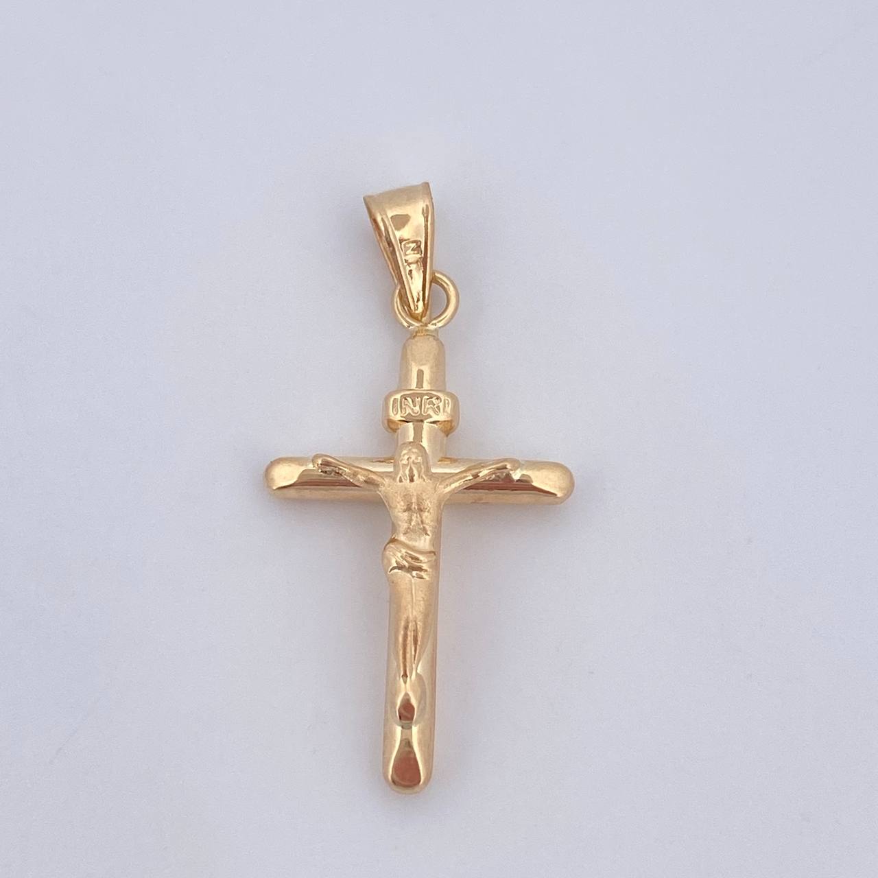 Cruz Cristo 0.7gr / 2.8cm / Oro 18K $