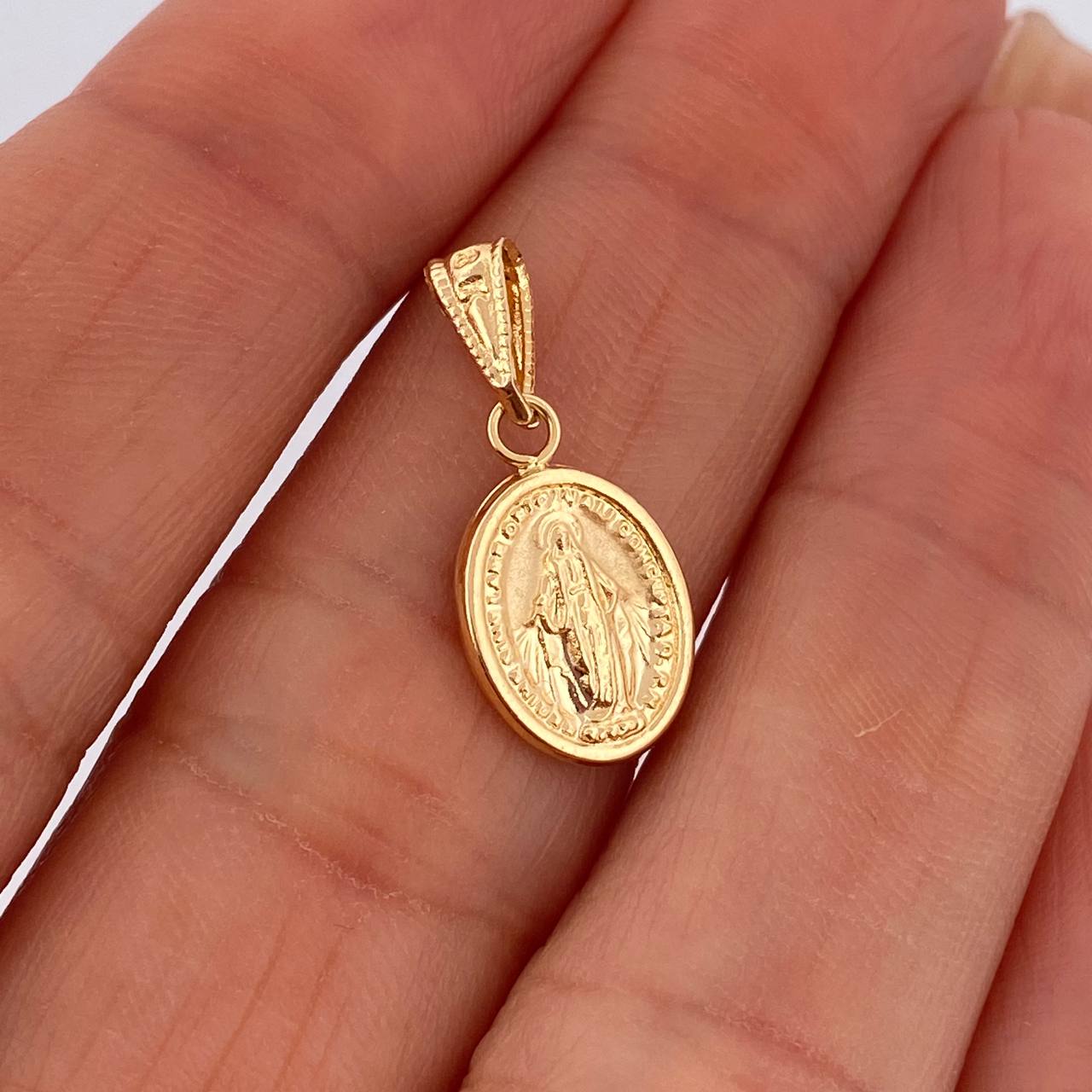 Dije Virgen Milagrosa 0.7gr / 2cm / Oro 18K $