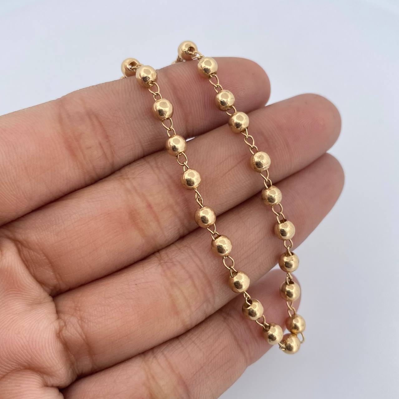 Pulso Tipo Militar 4.1gr / 18.2cm / 4mm Bolas Lisas Oro Amarillo 18K &