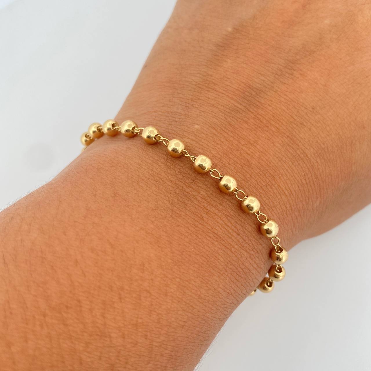 Pulso Tipo Militar 4.1gr / 18.2cm / 4mm Bolas Lisas Oro Amarillo 18K &