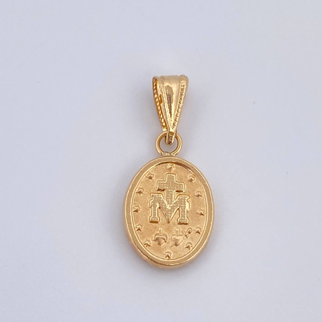 Dije Virgen Milagrosa 0.7gr / 2cm / Oro 18K $