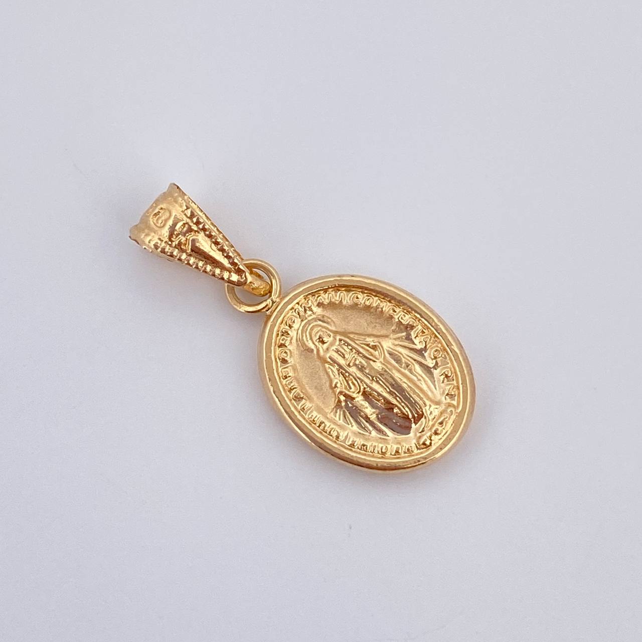 Dije Virgen Milagrosa 0.7gr / 2cm / Oro 18K $