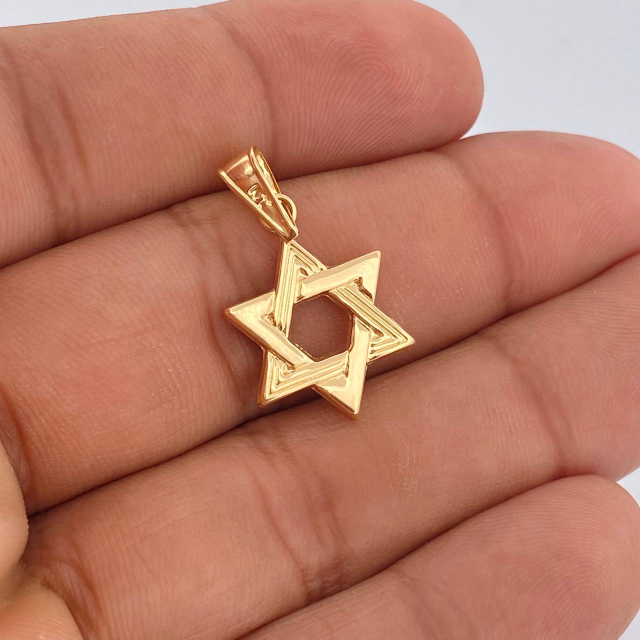 Dije Estrella De David 1.05gr / 1 in / Oro Amarillo 18K &