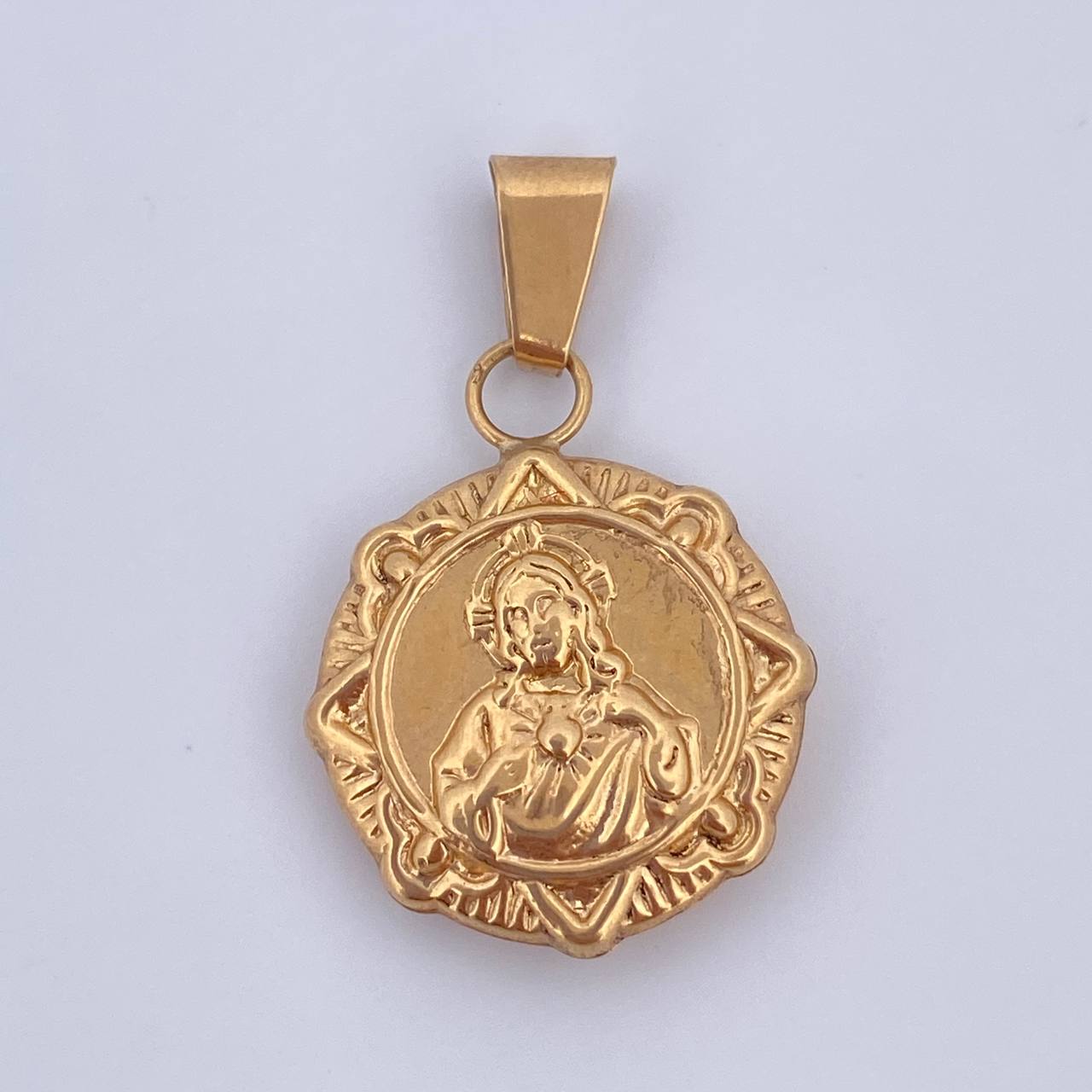 Dije Sagrado Corazon de Jesus 1.5gr / 2.6cm / Oro 18K $
