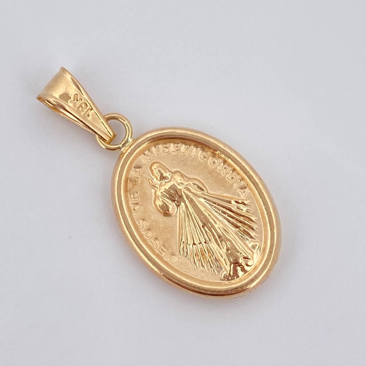 Dije Jesus de la Misericordia 1.6gr / 3cm / Oro 18K $