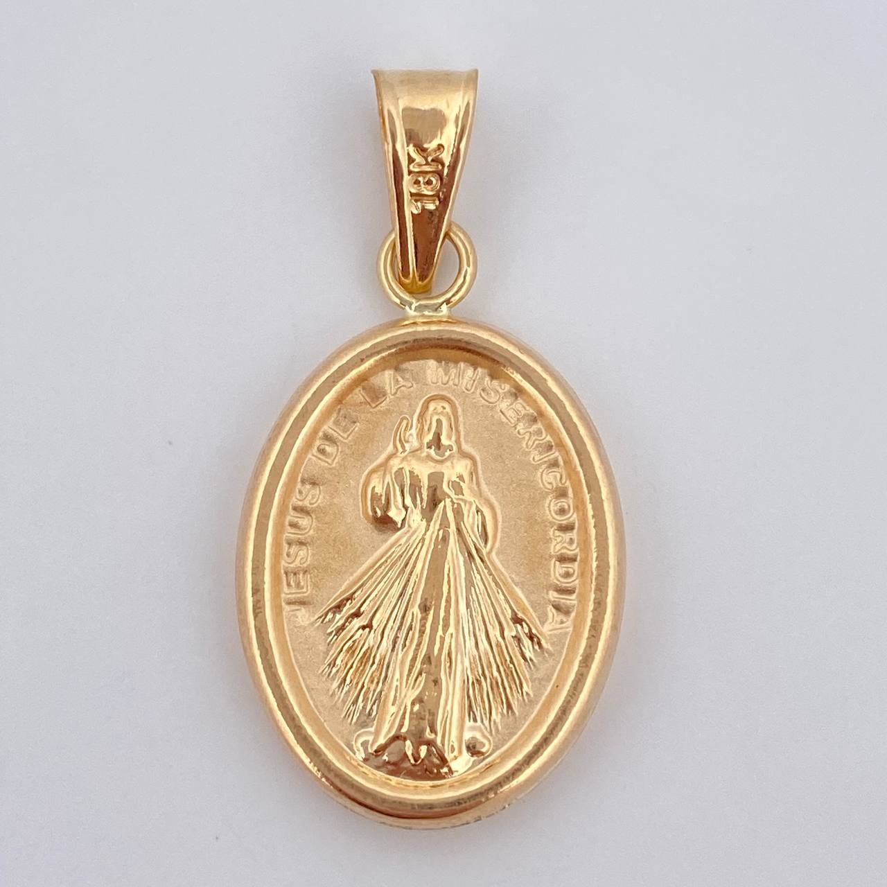 Dije Jesus de la Misericordia 1.55gr / 3cm / Oro 18K $