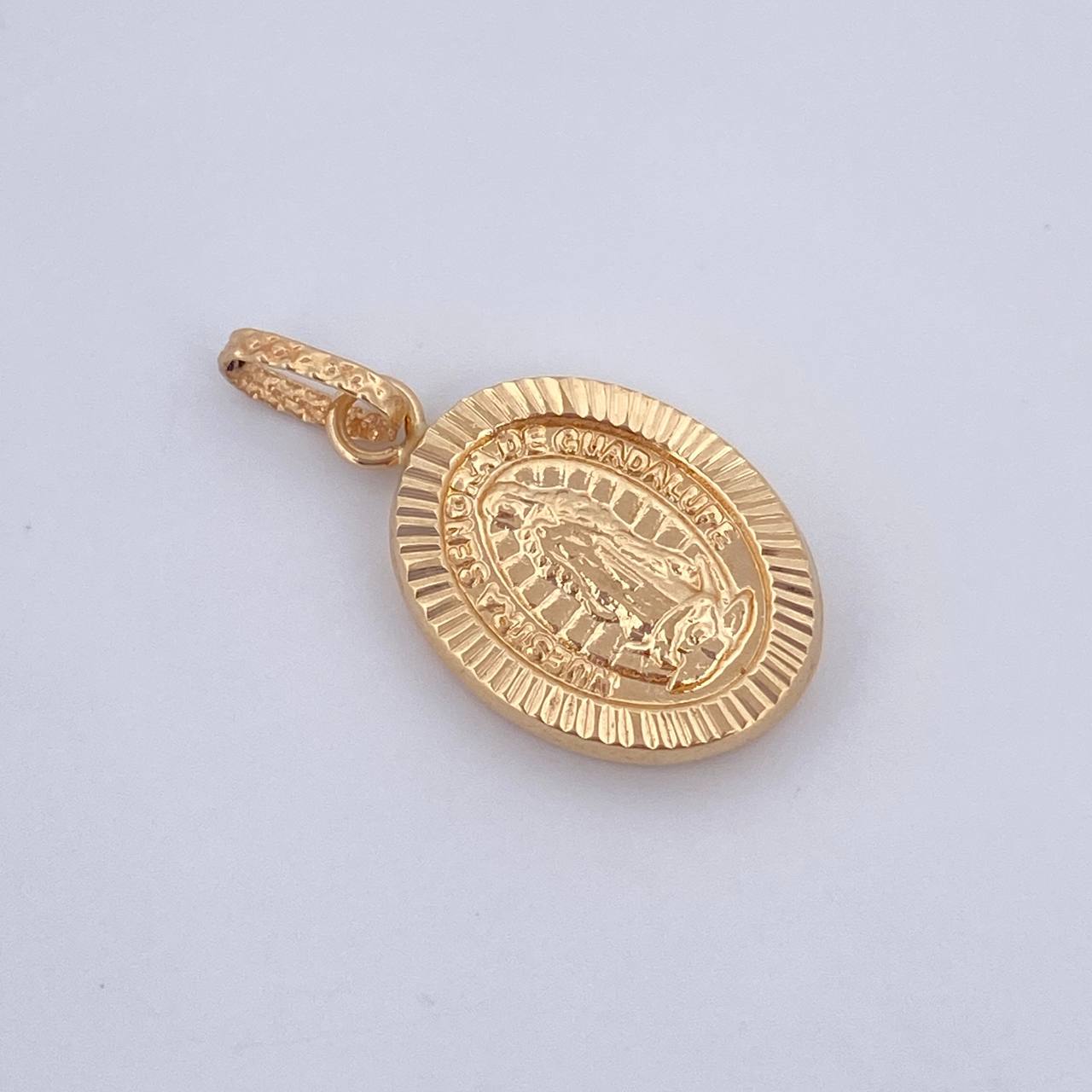 Dije Virgen de Guadalupe 1.15gr / 2.3cm / Oro 18K $