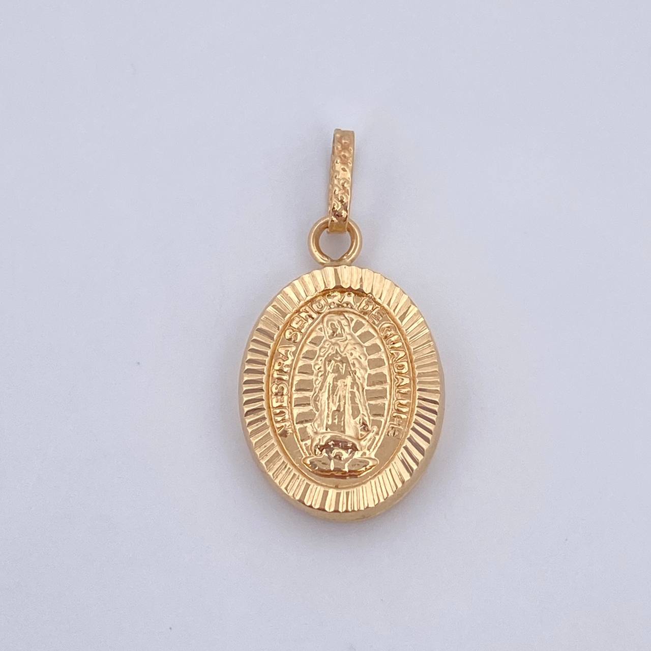 Dije Virgen de Guadalupe 1.15gr / 2.3cm / Oro 18K $