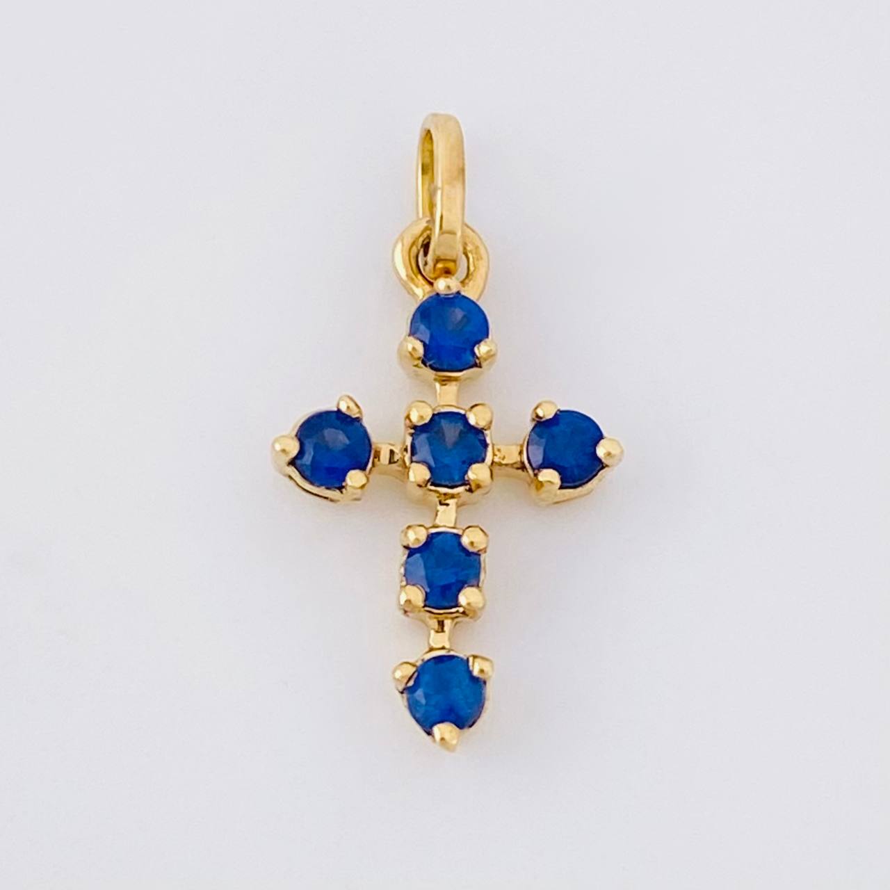 Dije Cruz Burbuja Zafiros 25pts 0.6g / 1/2 in Oro Amarillo 18K