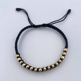 Pulsera Negra 3mm 31 Und Bolas Lisas Oro Amarillo 18K (A.C)
