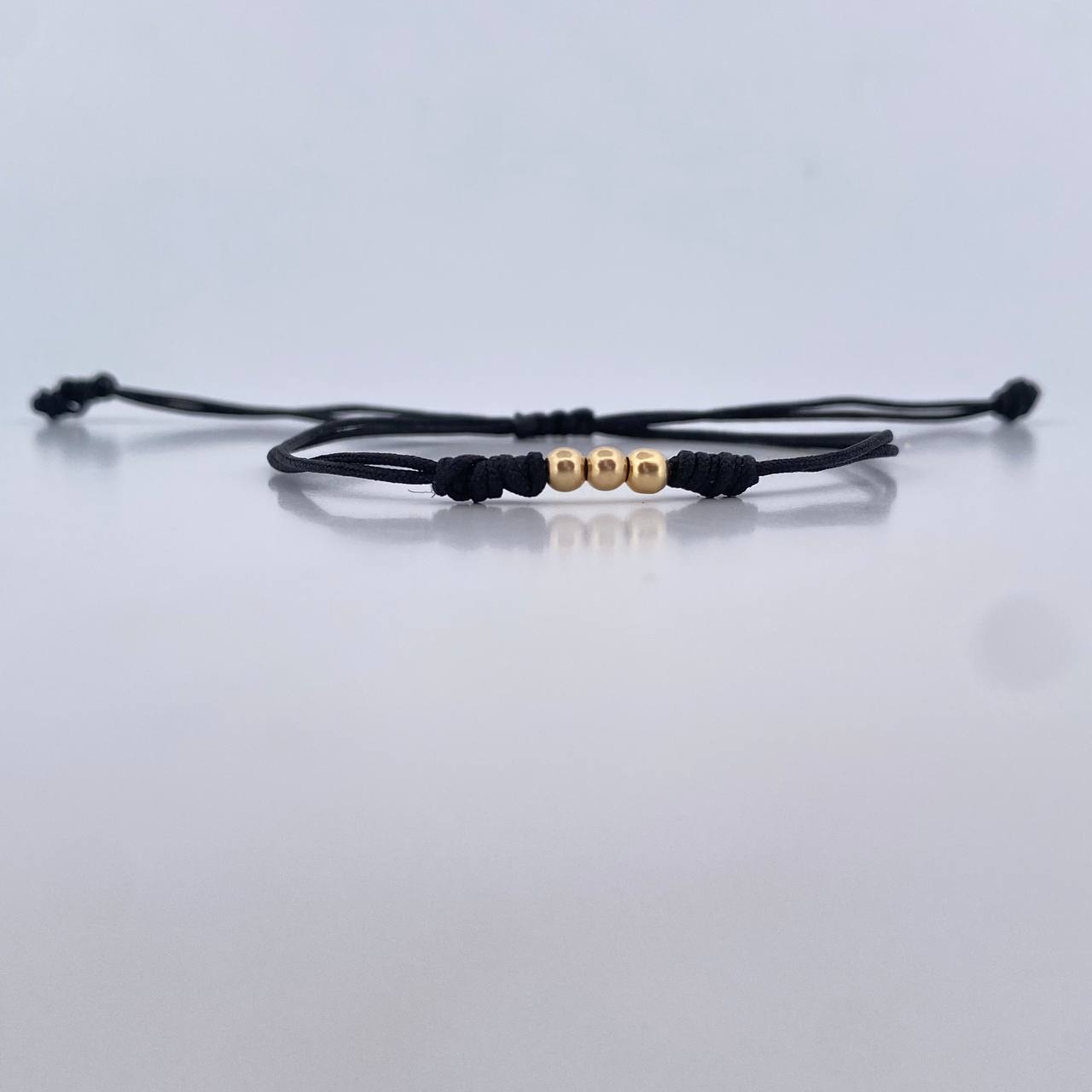 Pulsera Negra 3mm Bolas Lisas 3und Oro Amarillo 18K (A.C)