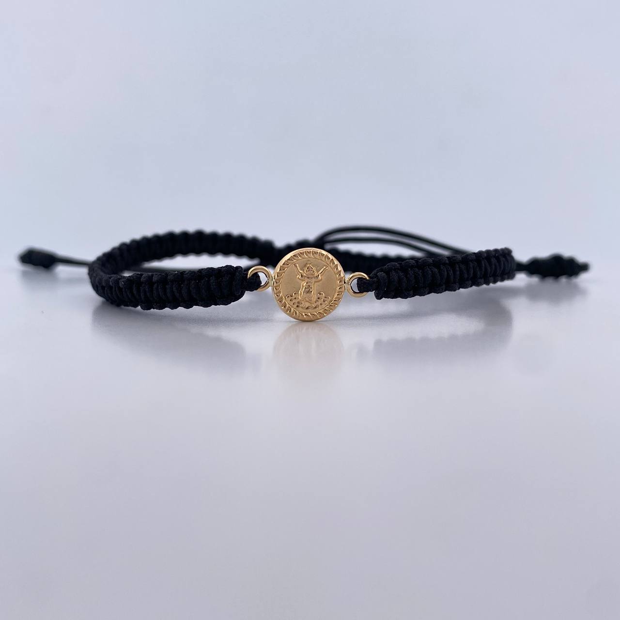 Pulsera Negra Divino Niño 0.45gr / Oro Amarillo 18K &
