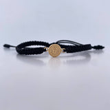 Pulsera Negra Divino Niño 0.45gr / Oro Amarillo 18K &