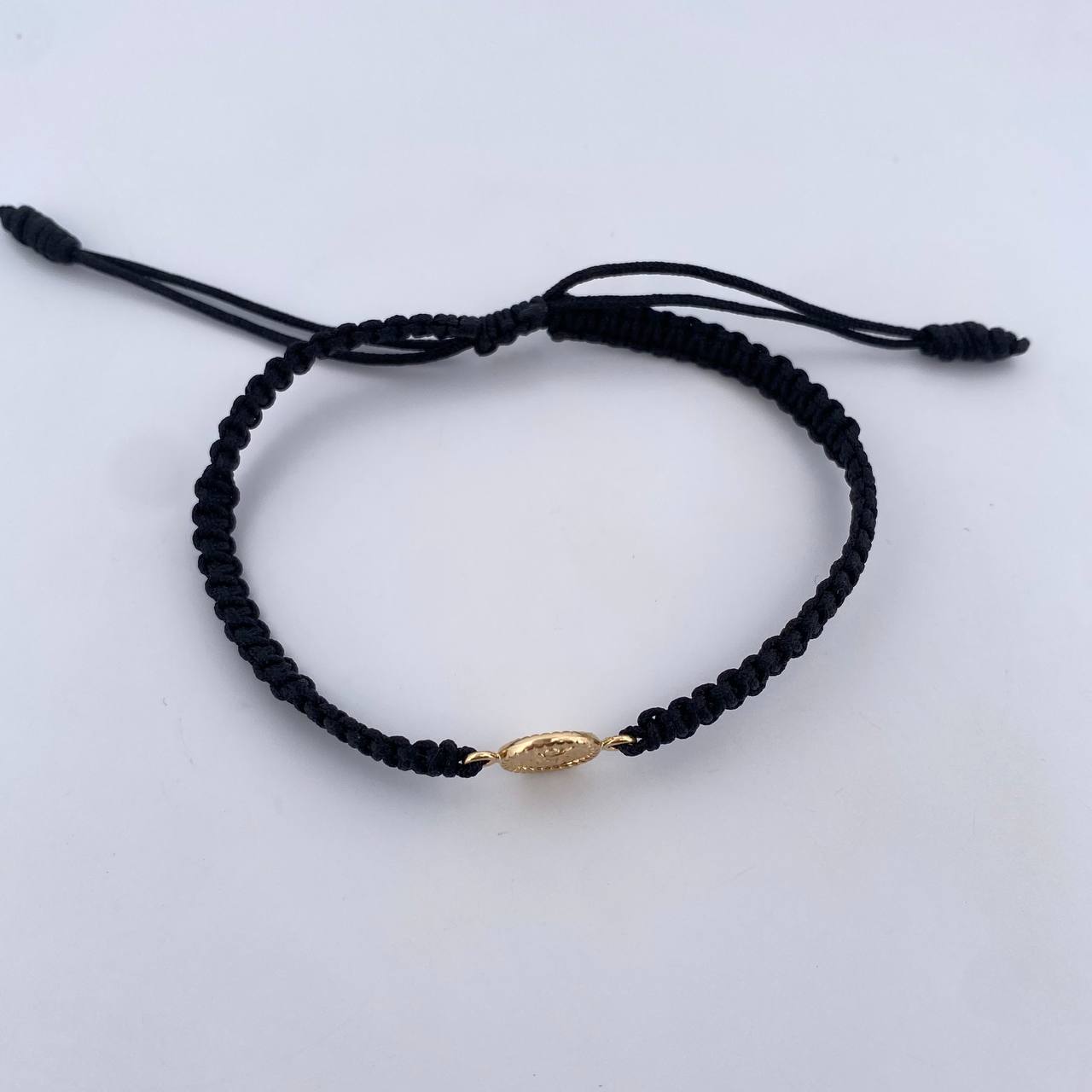 Pulsera Negra Divino Niño 0.45gr / Oro Amarillo 18K &