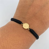 Pulsera Negra Divino Niño 0.45gr / Oro Amarillo 18K &