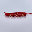 Pulsera Roja 4mm 3 Und Bolas Lisas Neoprenos Oro Amarillo 18K (A.C)