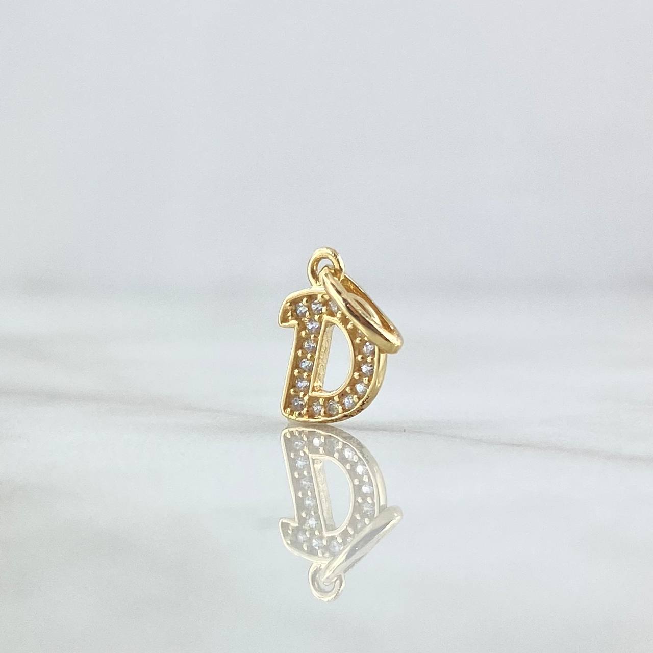 Dije Letra D Silueta 0.65gr / 1.6cm / Circones Blancos Oro Amarillo 18K