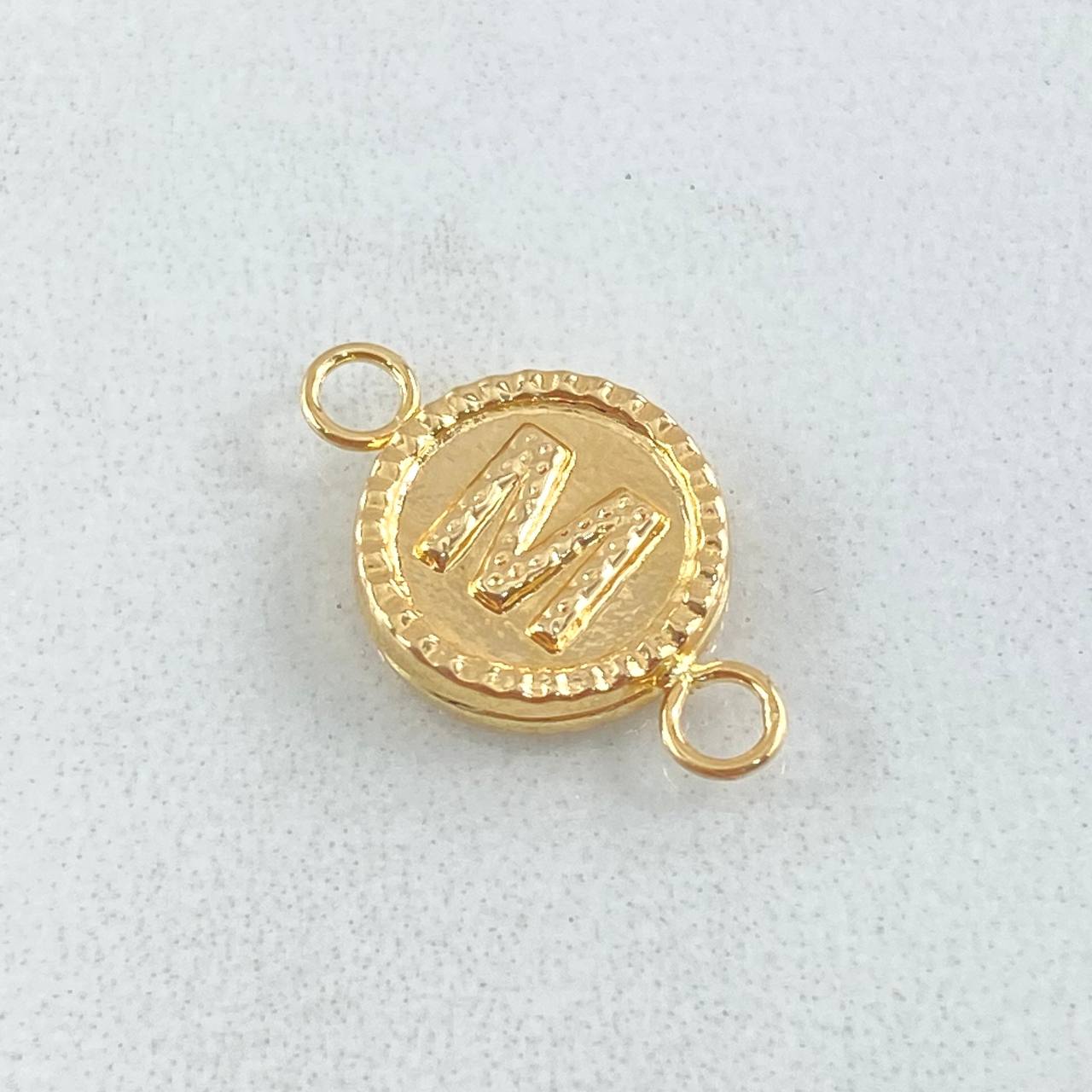 Herraje Letra M 0.55gr / 1.7cm / Oro 18K