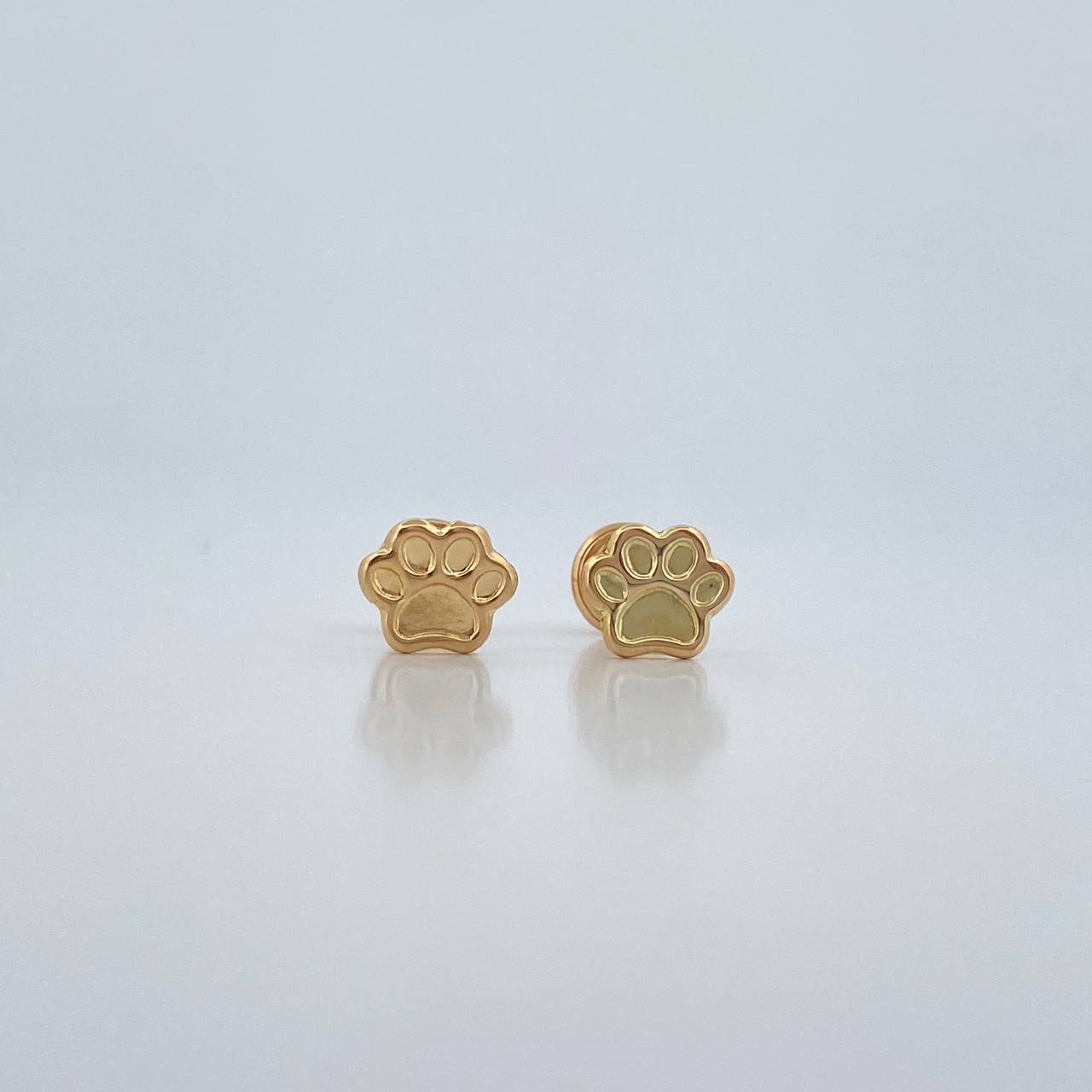 Topos Huella 0.55gr / Oro Amarillo 18K $