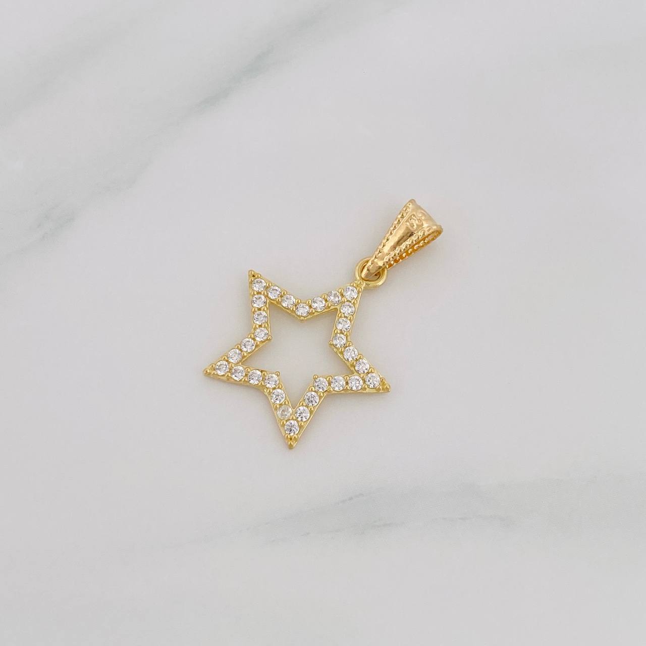 Dije Silueta Estrella 0.95g / 1 in Oro Amarillo 18K