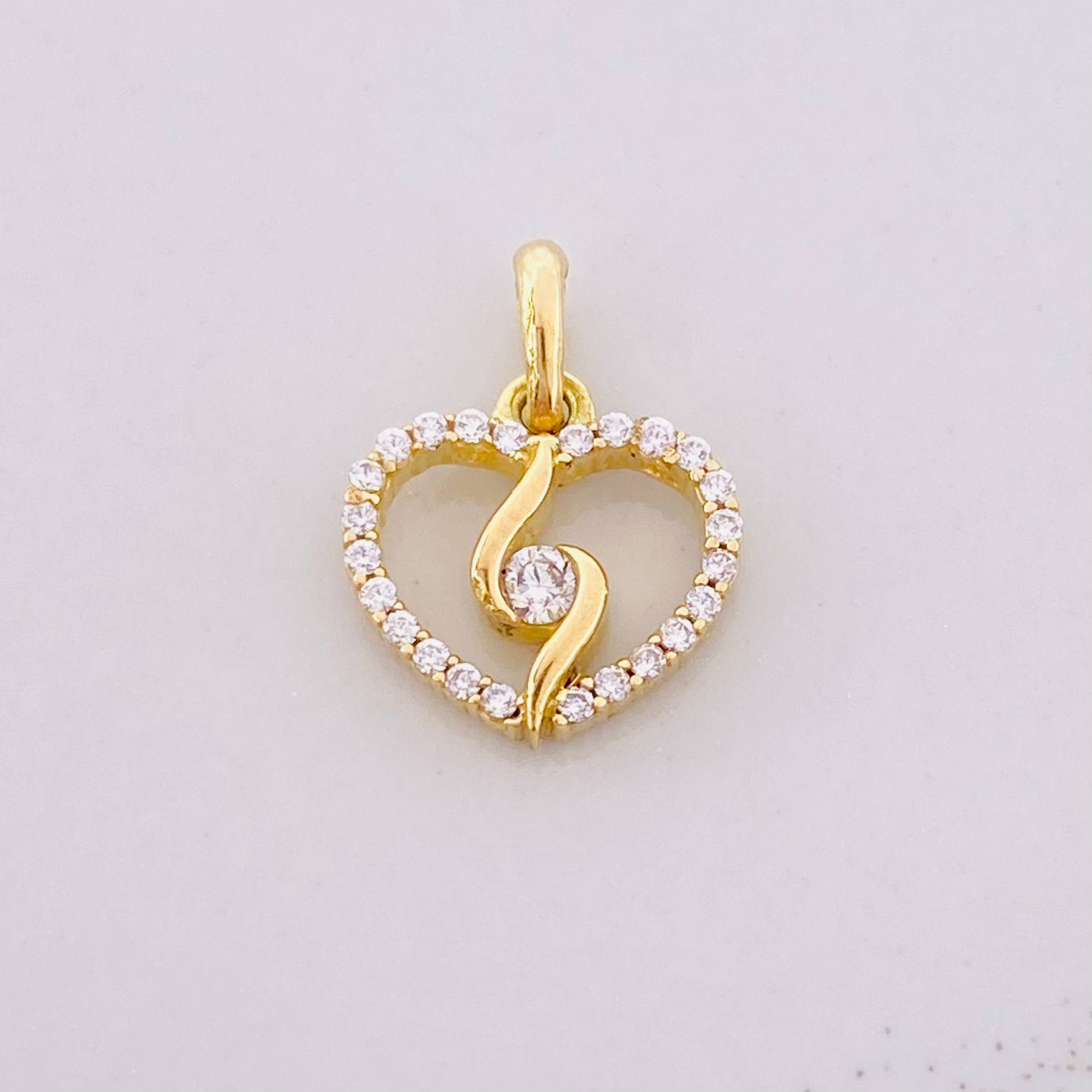 Dije Silueta Espiral 0.95g / 1/2 in Oro Amarillo 18K