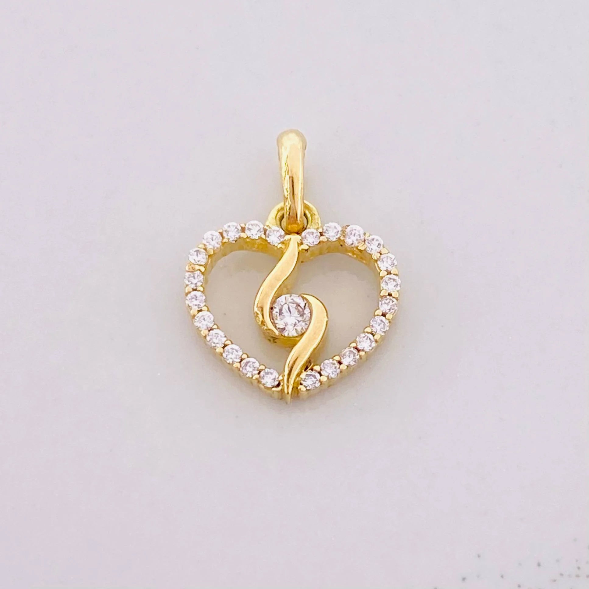 Dije Silueta Espiral 0.9g / 1/2 in Oro Amarillo 18K