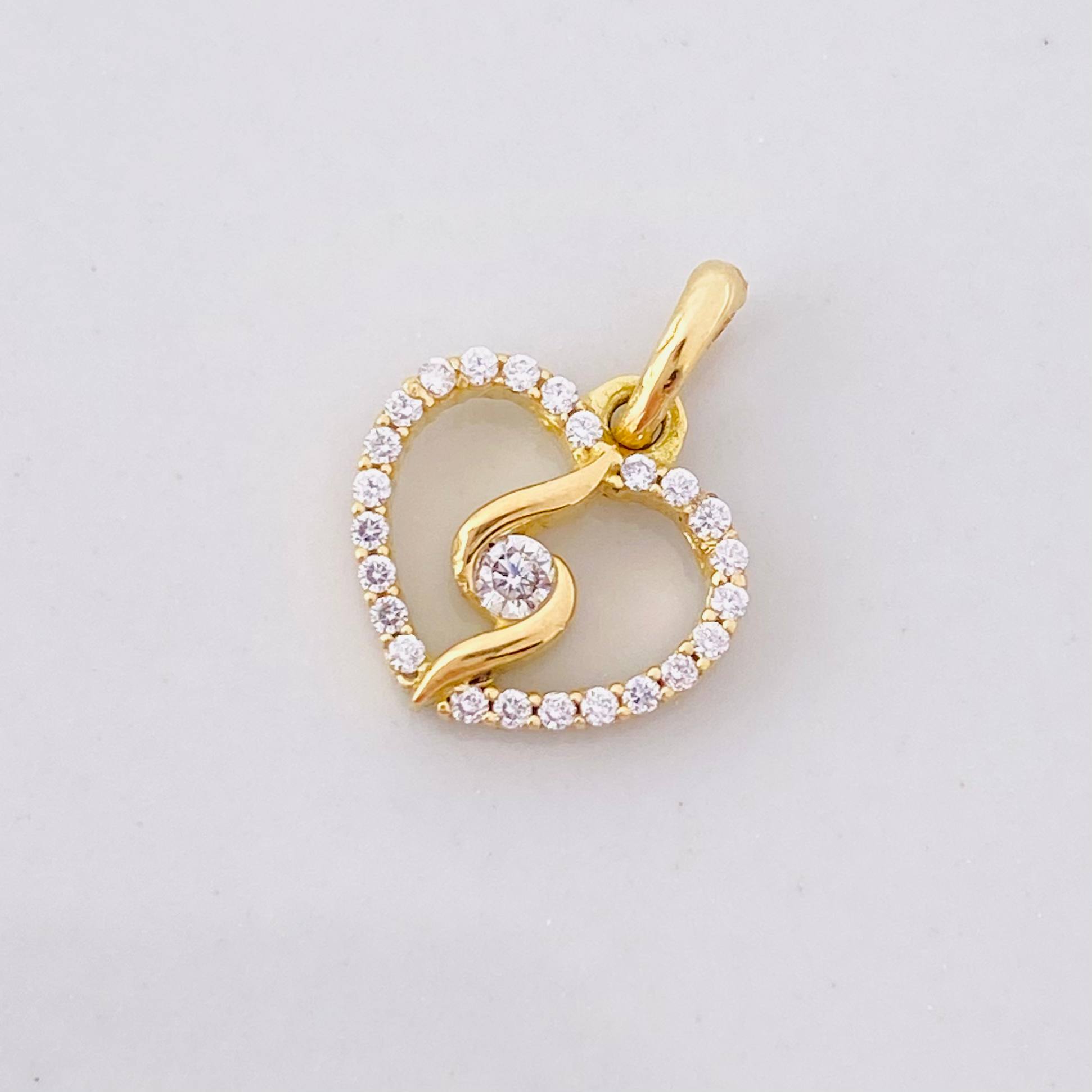 Dije Silueta Espiral 0.95g / 1/2 in Oro Amarillo 18K