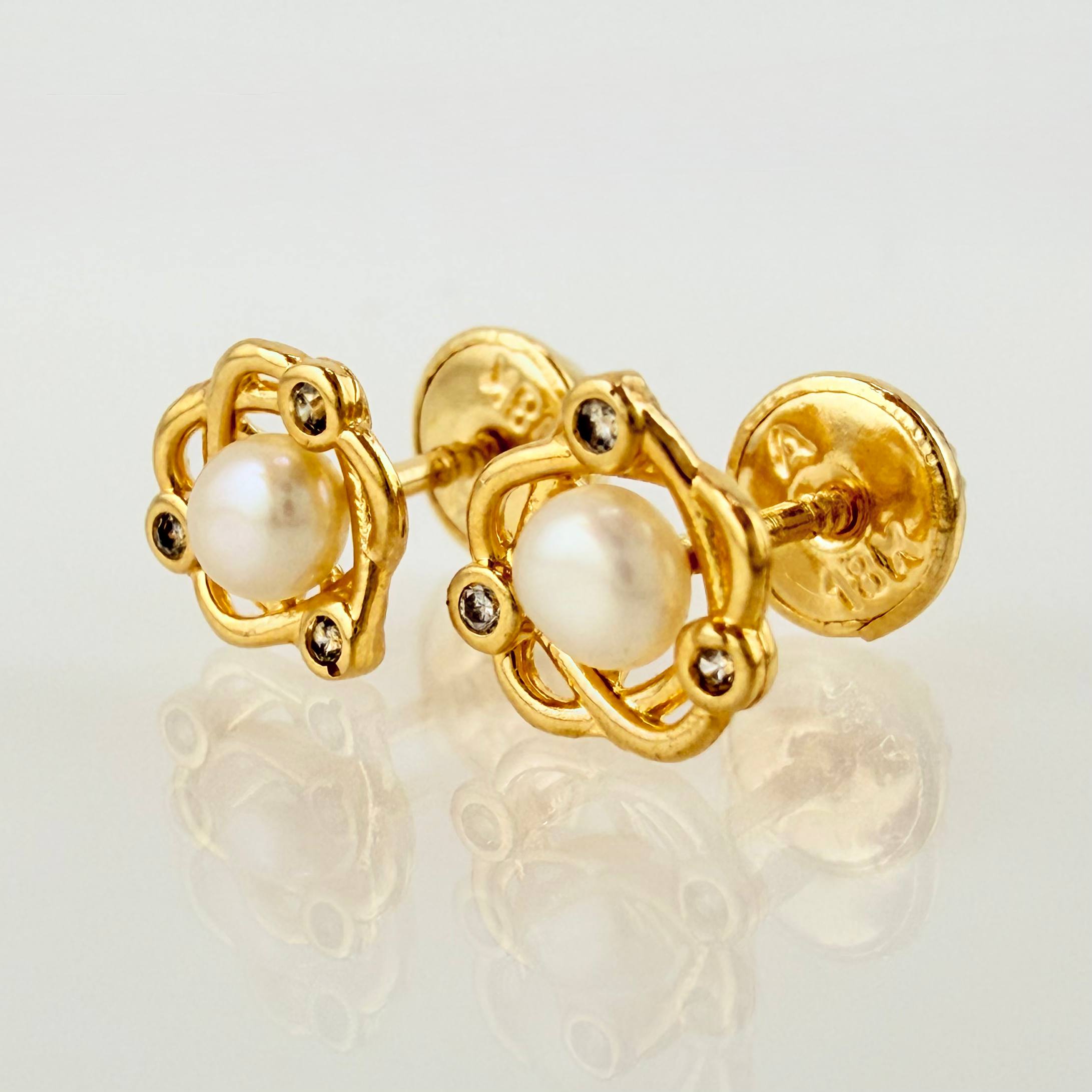 Topos Saturno 0.95gr / 7mm Oro Amarillo 18K ©