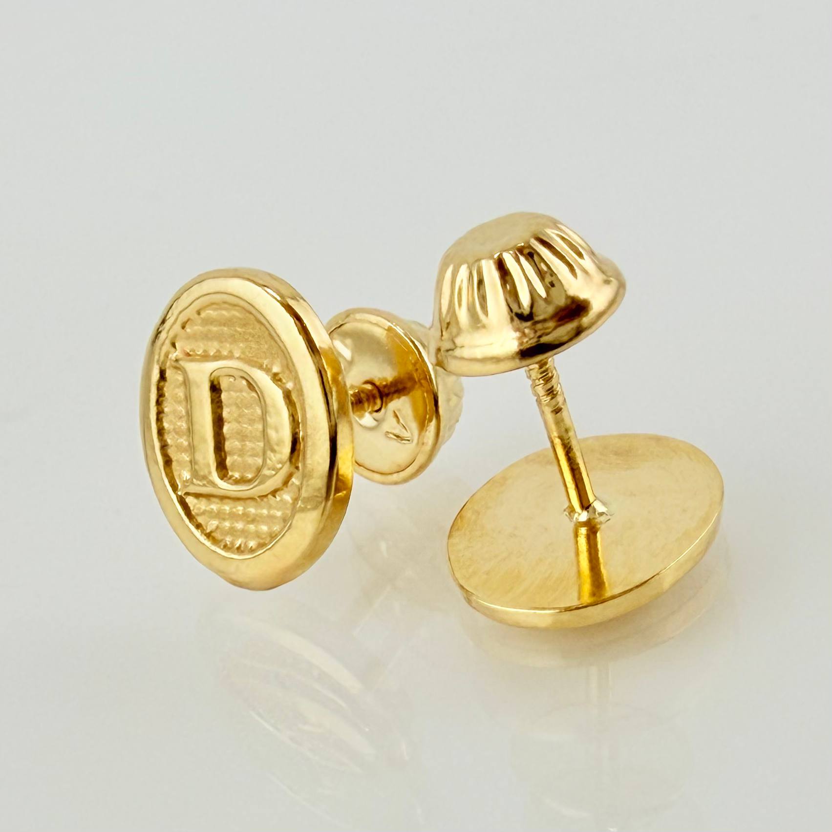 Topos Letra D 0.8gr / 9mm Oro Amarillo 18K *