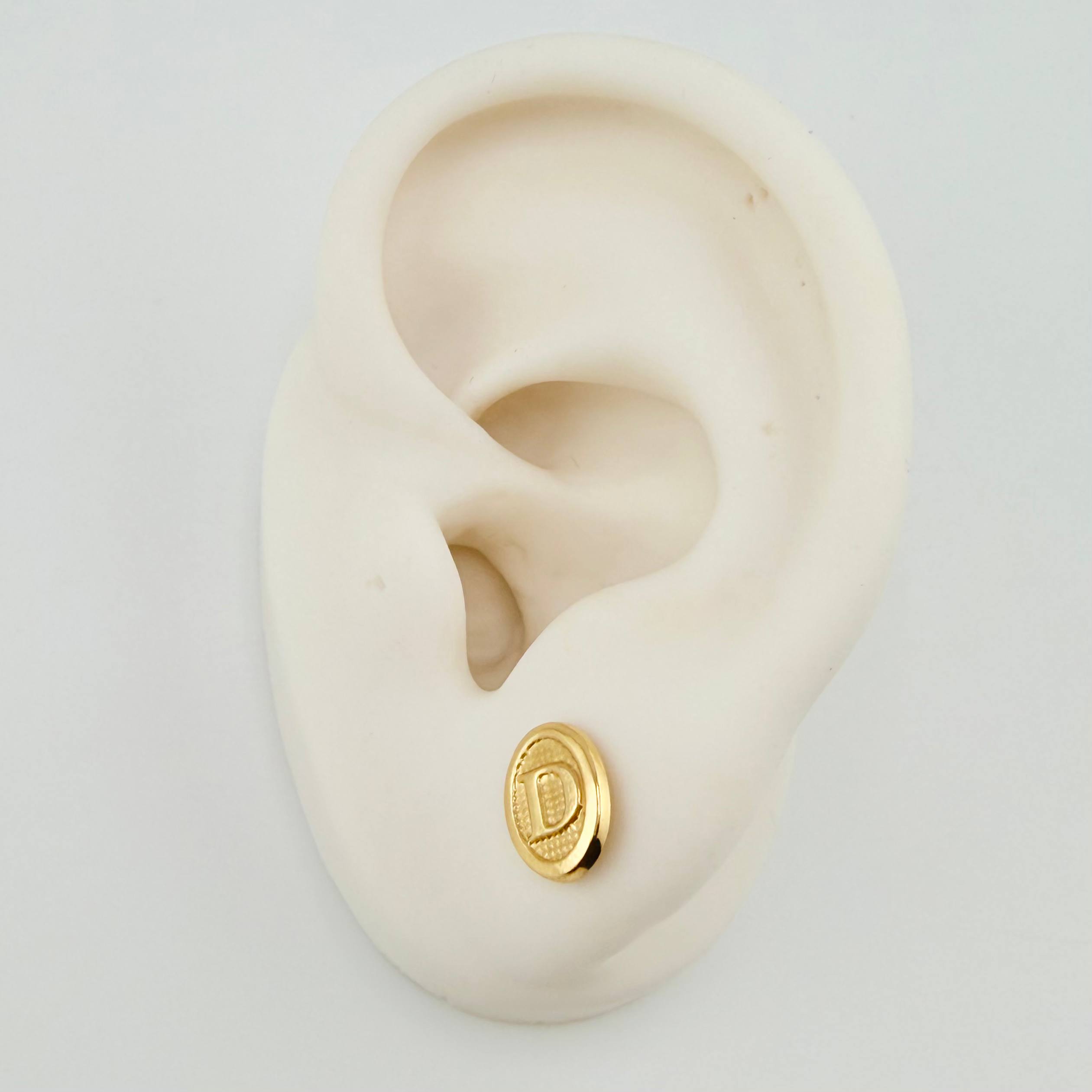 Topos Letra D 0.8gr / 9mm Oro Amarillo 18K *