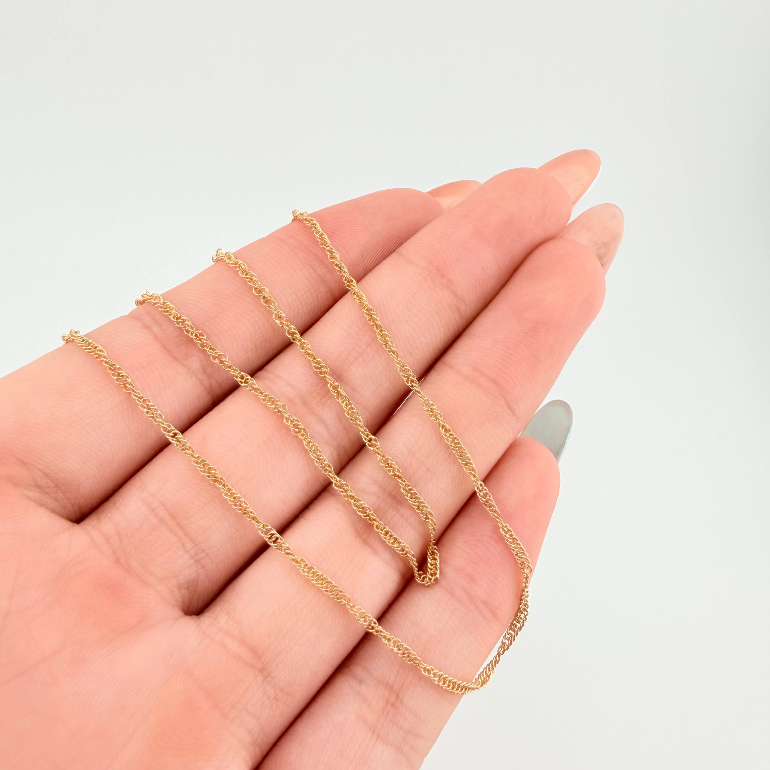 Cadena Singapur 3.05gr / 23 1/2 in / 1.5mm Oro Amarillo +3 18K