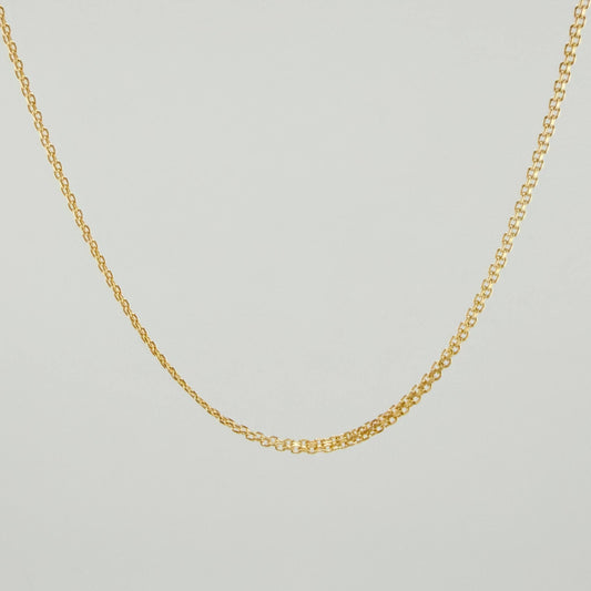 Cadena China 3.2gr / 23 1/2 in / 1.5mm Oro Amarillo +1 18K