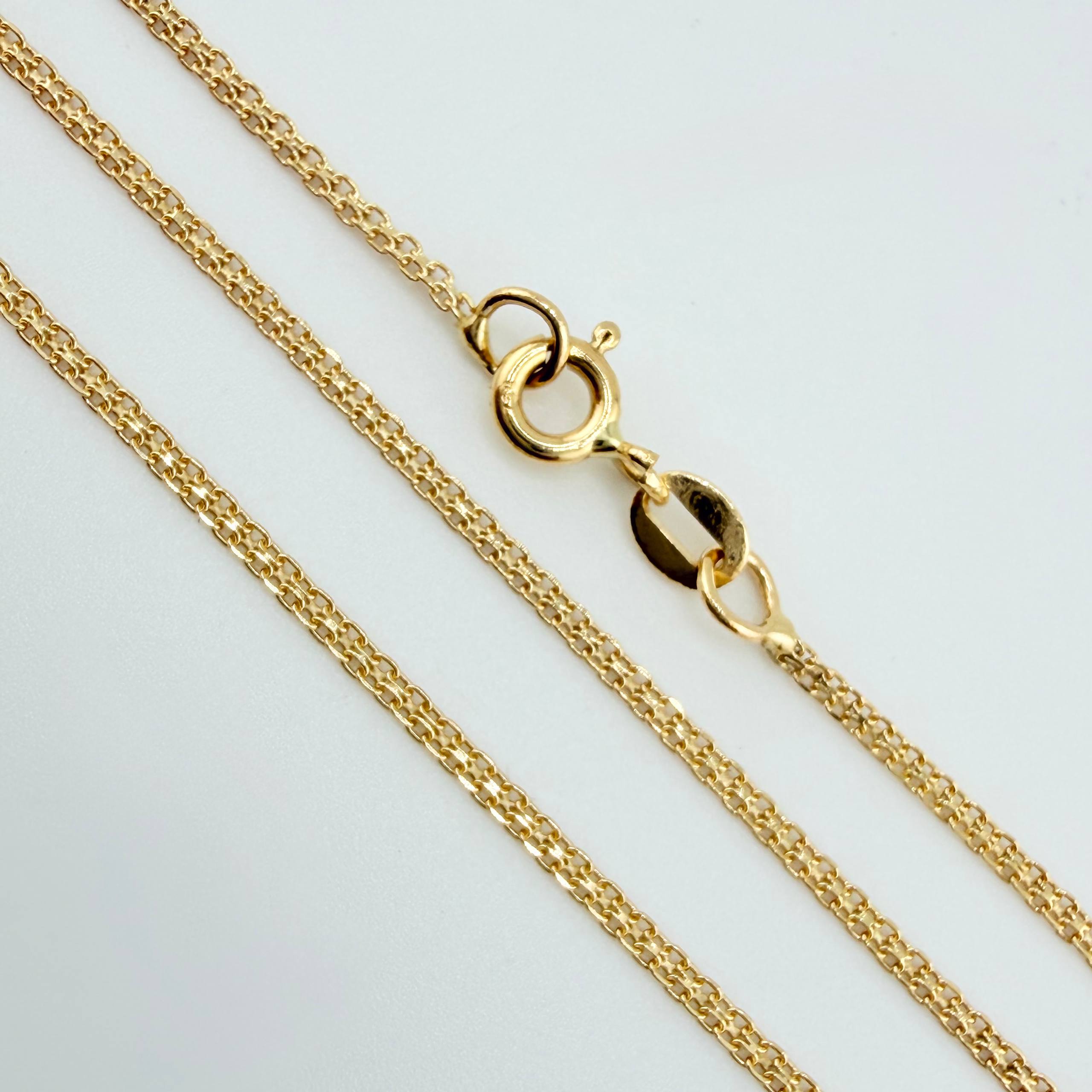 Cadena China 3.05gr / 23 1/2 in / 1.4mm Oro Amarillo +1 18K