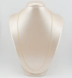 Cadena China 3.2gr / 23 1/2 in / 1.5mm Oro Amarillo +1 18K