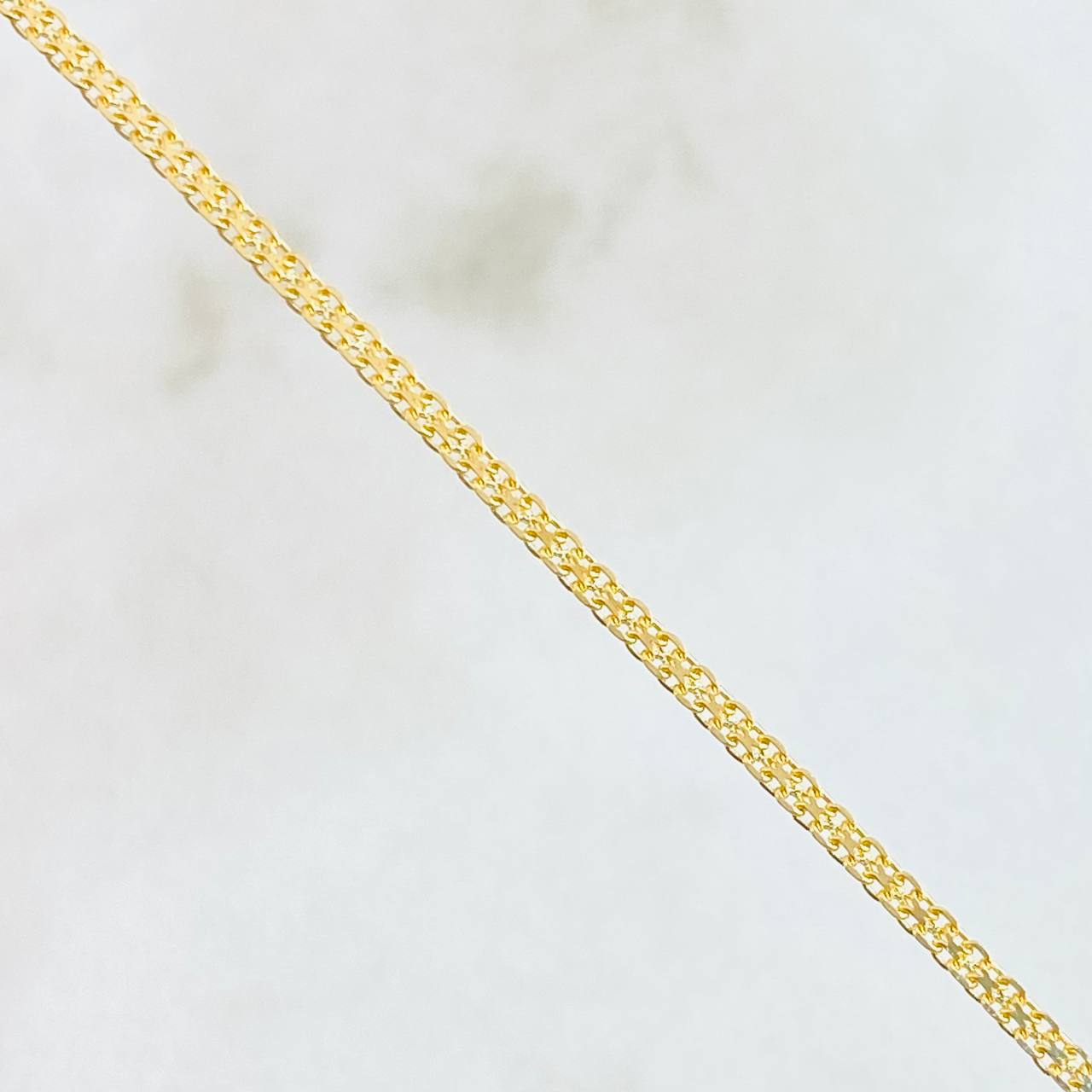 Cadena China 2.4gr / 23 1/2 in / 1.2mm Oro Amarillo +1 18K *
