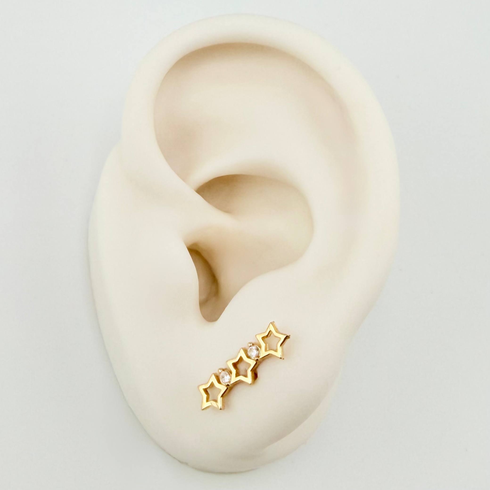 Topos Trío Estrellas 1.15gr / 3/4 in / Oro Amarillo 18K