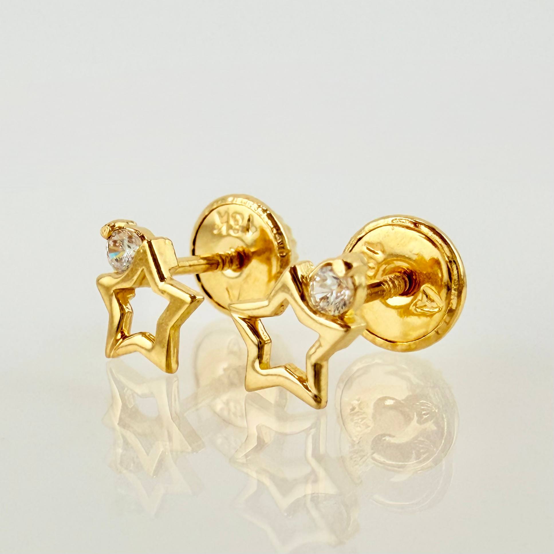 Topos Silueta Estrella 0.65gr / 6mm Oro Amarillo 18K