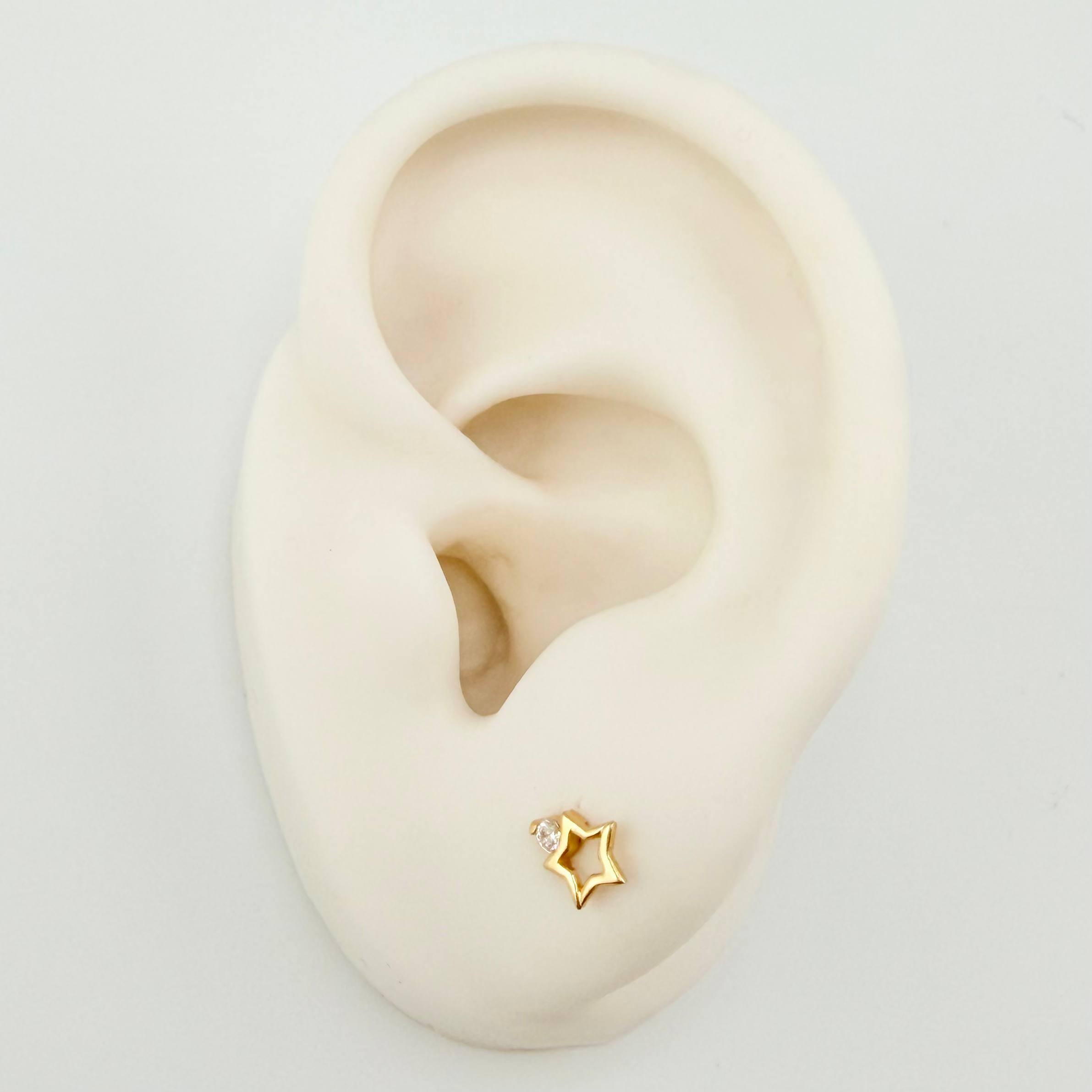 Topos Silueta Estrella 0.65gr / 6mm Oro Amarillo 18K