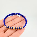 Royal Blue Woven Bracelet Neoros 4Und / Beads 5Und 4Mm-5Mm-6Mm Yellow Gold 18K