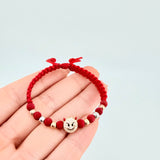 Pulsera Tejida Roja Herraje Emoji Diablito/ Bolas 6Und 4mm Tres Oros 18K