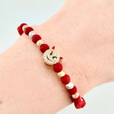 Pulsera Tejida Roja Herraje Emoji Diablito/ Bolas 6Und 4mm Tres Oros 18K