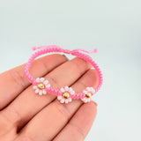 Pulsera Tejida Rosada Trio Flores Oro Amarillo 18K