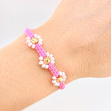 Pulsera Tejida Rosada Trio Flores Oro Amarillo 18K