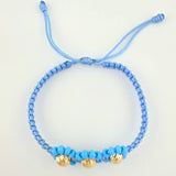 Pulsera Tejida Azul Trio Flores Oro Amarillo 18K